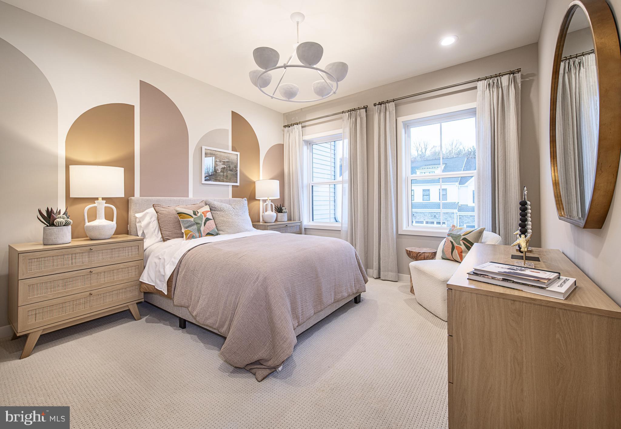 606 Kemlyn Road, Unit HOMESITE 184 Malvern, PA 19355 - Photo 3 of 15 a spacious bedroom with a bed and a dresser