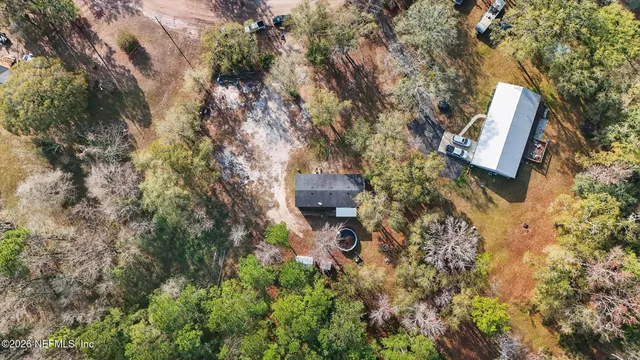a backyard of a house with lots of green space and fog