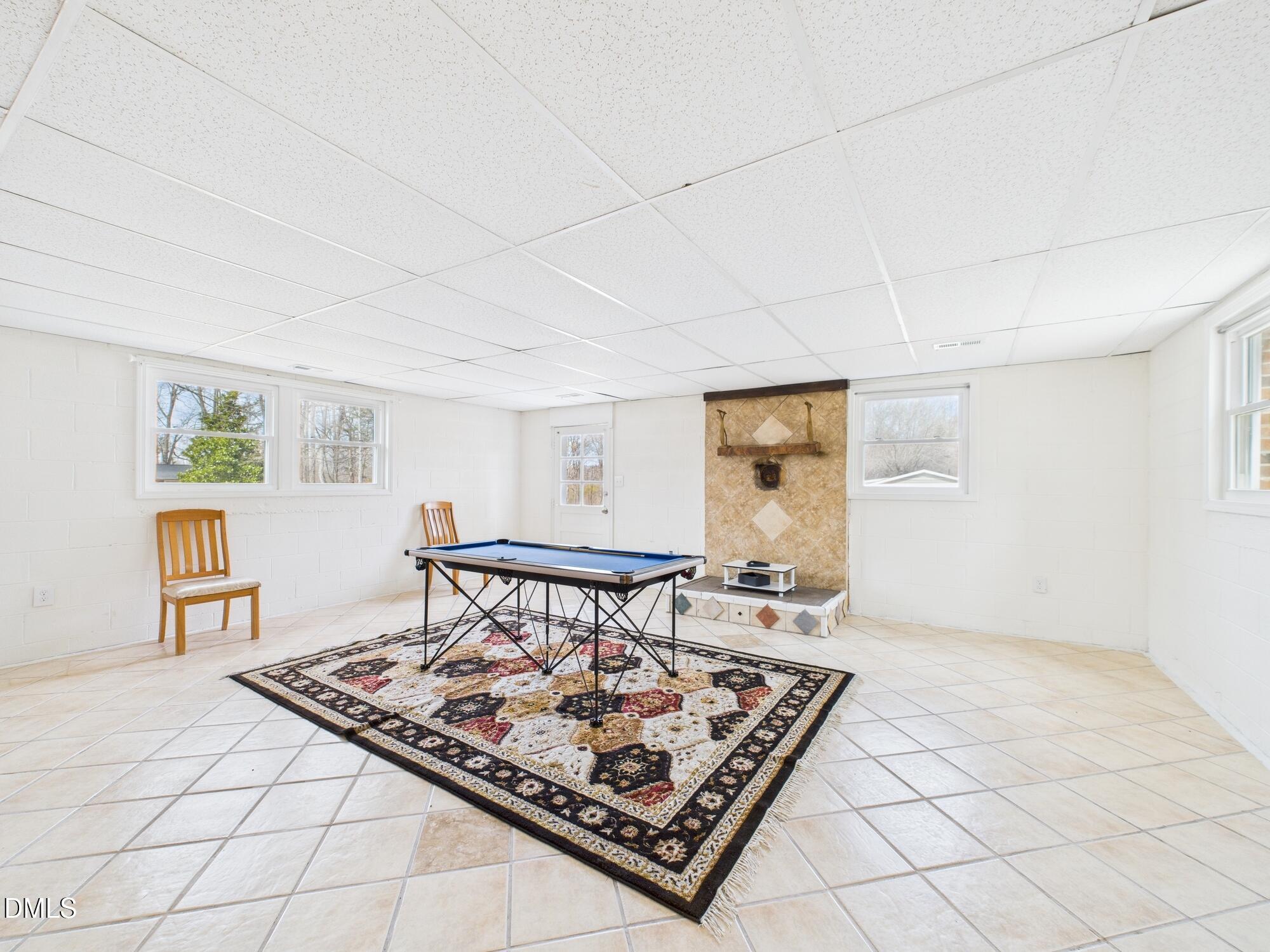 72 Edgemont Avenue Roxboro, NC 27573 - Photo 20 of 45 a living room with a rug