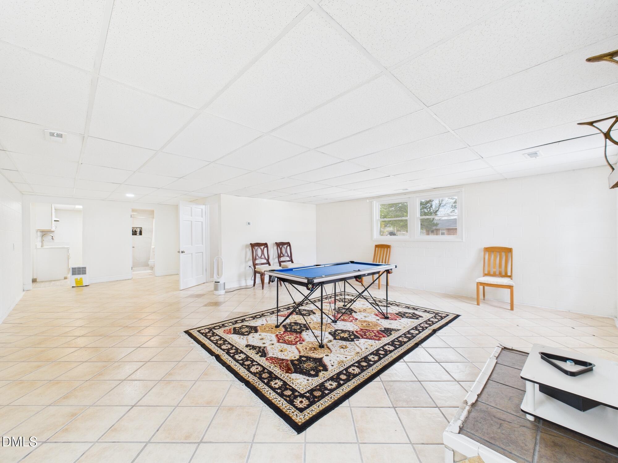 72 Edgemont Avenue Roxboro, NC 27573 - Photo 21 of 45 a living room with furniture and a table
