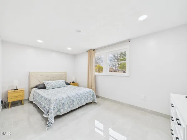 a living room with a rug