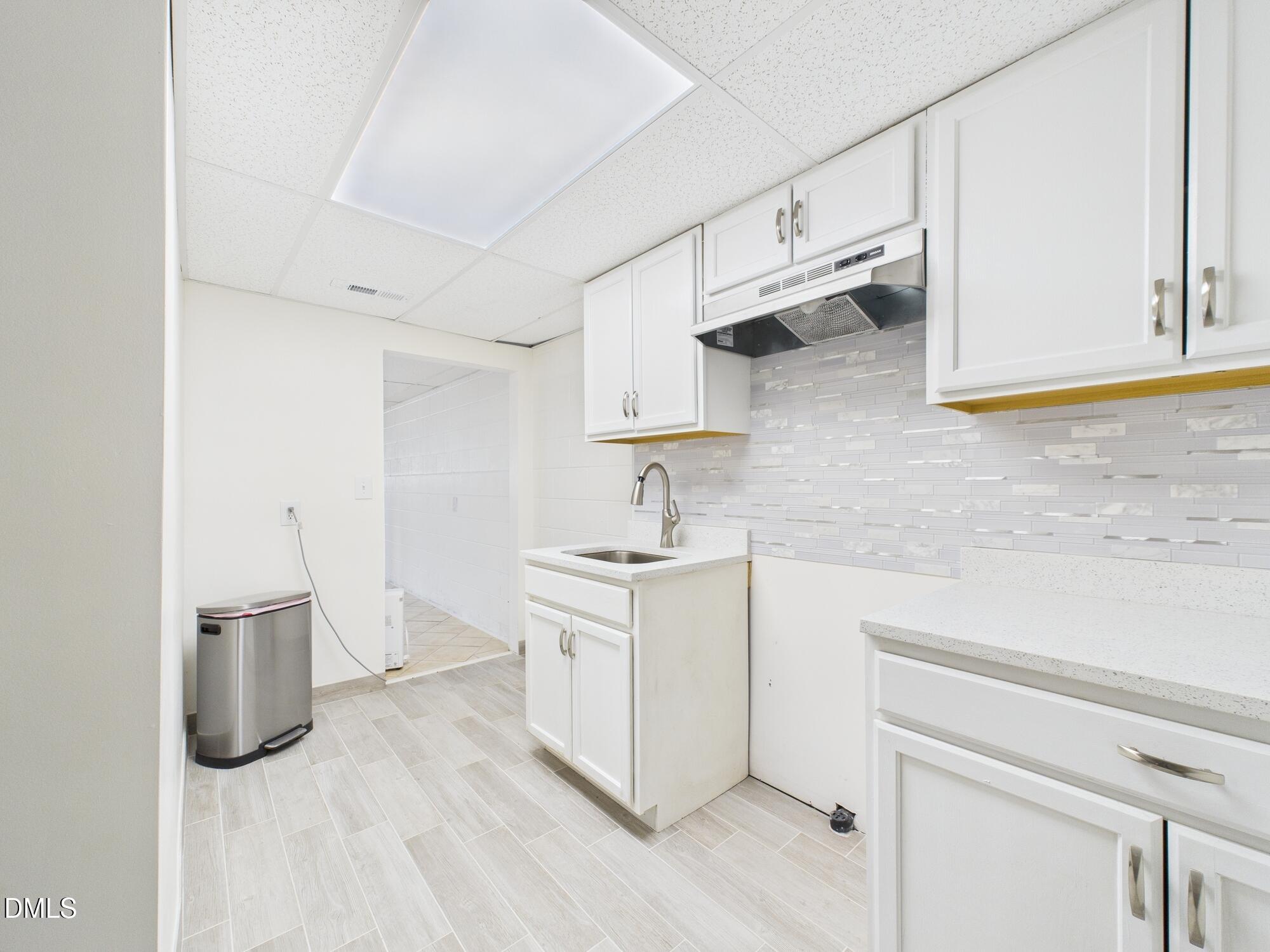 72 Edgemont Avenue Roxboro, NC 27573 - Photo 24 of 45 a kitchen with stainless steel appliances granite countertop a sink stove and cabinets