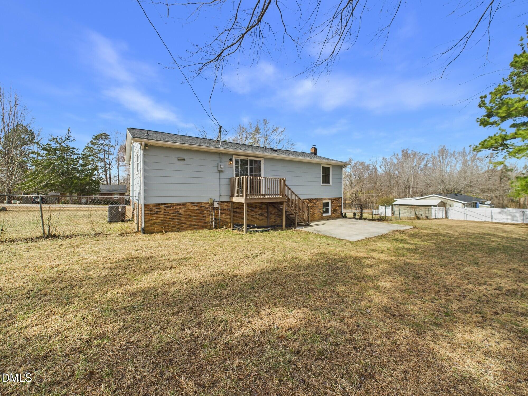 72 Edgemont Avenue Roxboro, NC 27573 - Photo 26 of 45 a view of a house with a yard