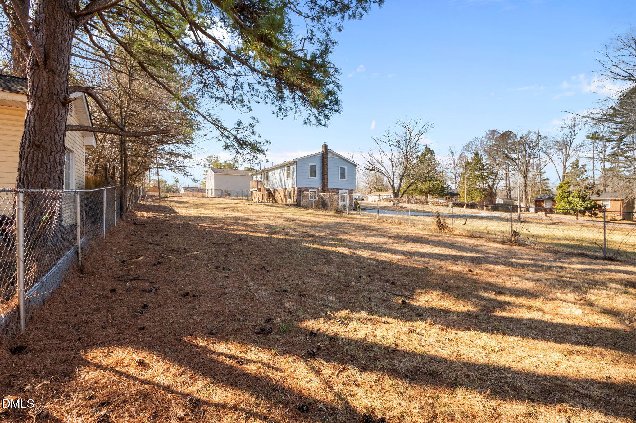 72 Edgemont Avenue Roxboro, NC 27573 - Photo 31 of 45 a view of a town with large trees