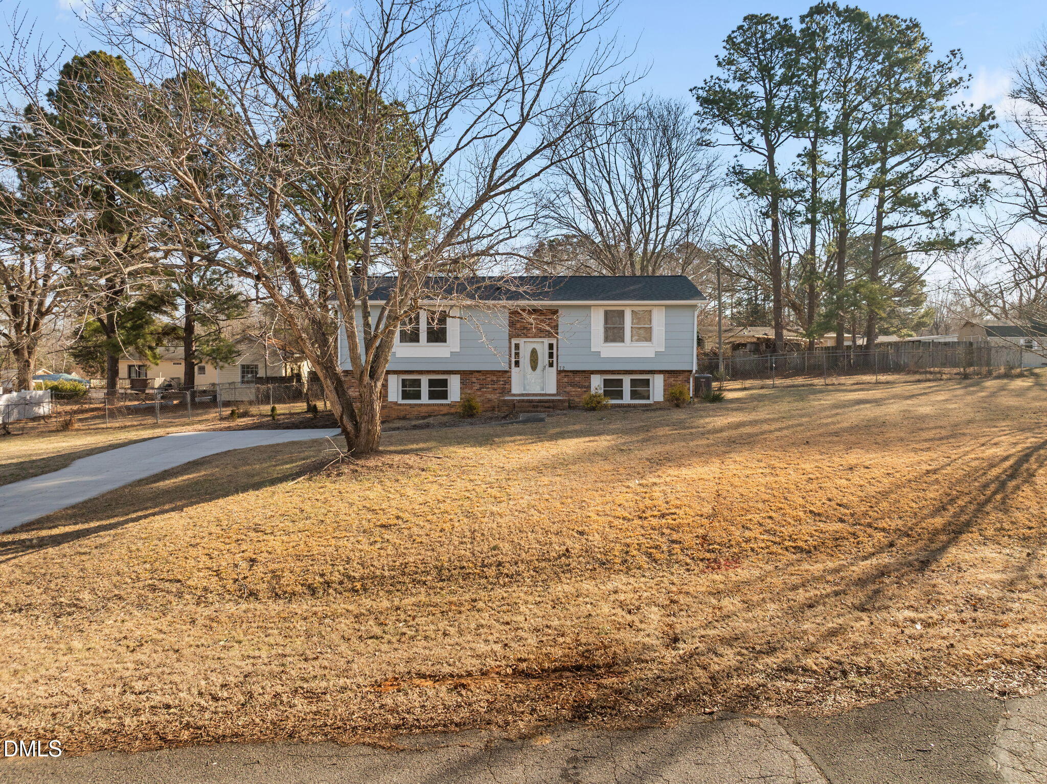 72 Edgemont Avenue Roxboro, NC 27573 - Photo 42 of 45 a view of a house with a large tree in front of a house