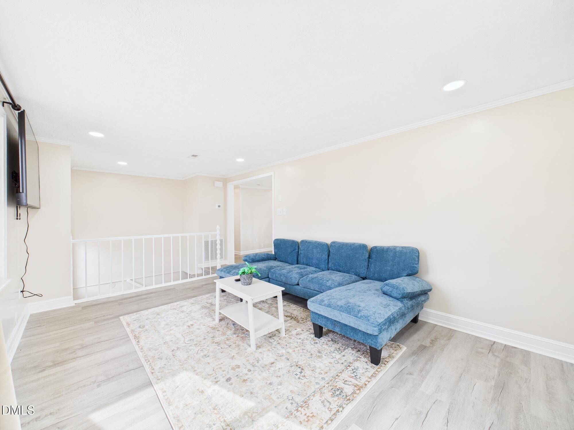 72 Edgemont Avenue Roxboro, NC 27573 - Photo 5 of 45 a living room with furniture and a couch