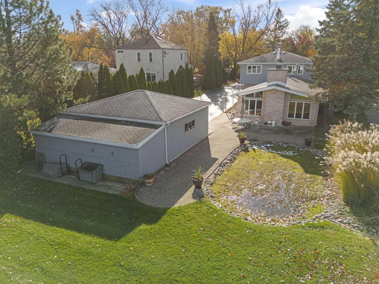 3068 Hickory Road Homewood, IL 60430 - Photo 28 of 44 a aerial view of a house with a yard table and chairs