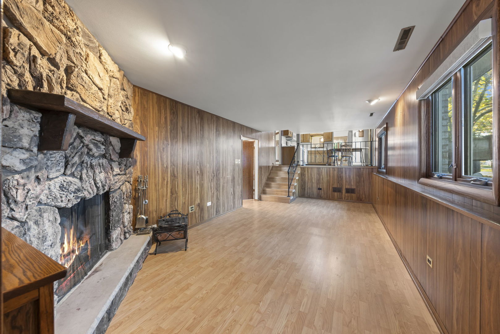 3068 Hickory Road Homewood, IL 60430 - Photo 10 of 44 a view of a hallway with wooden floor and staircase