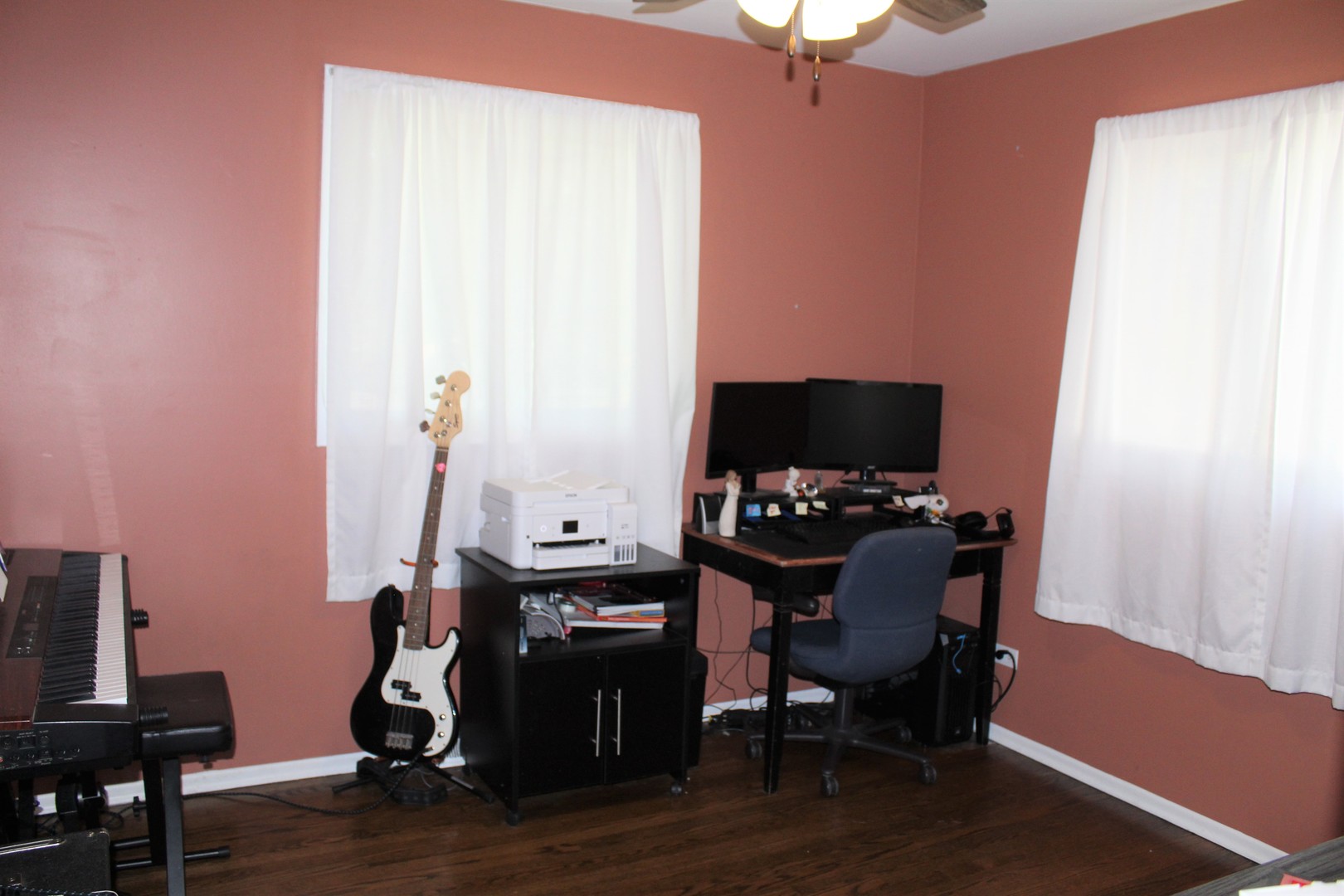 414 Northgate Road Lindenhurst, IL 60046 - Photo 12 of 22 a room with furniture and wooden floor