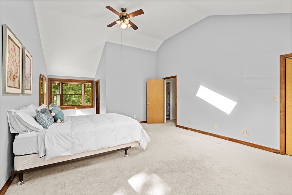 449 Potter Road Framingham, MA 01701 - Photo 9 of 25 a bedroom with a bed and a window