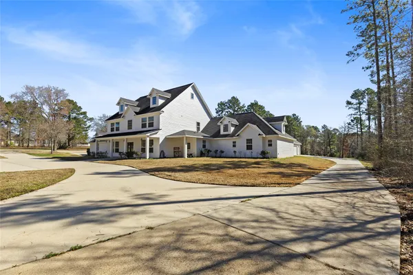 a view of houses with yard