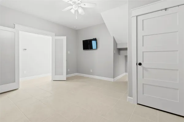 an empty room with a bathroom