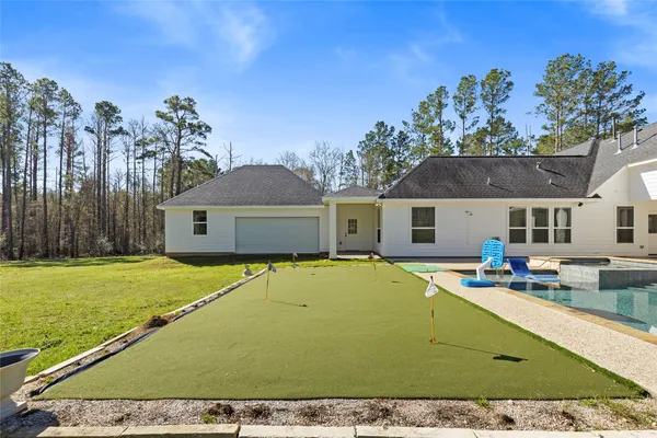 a view of a house with a swimming pool