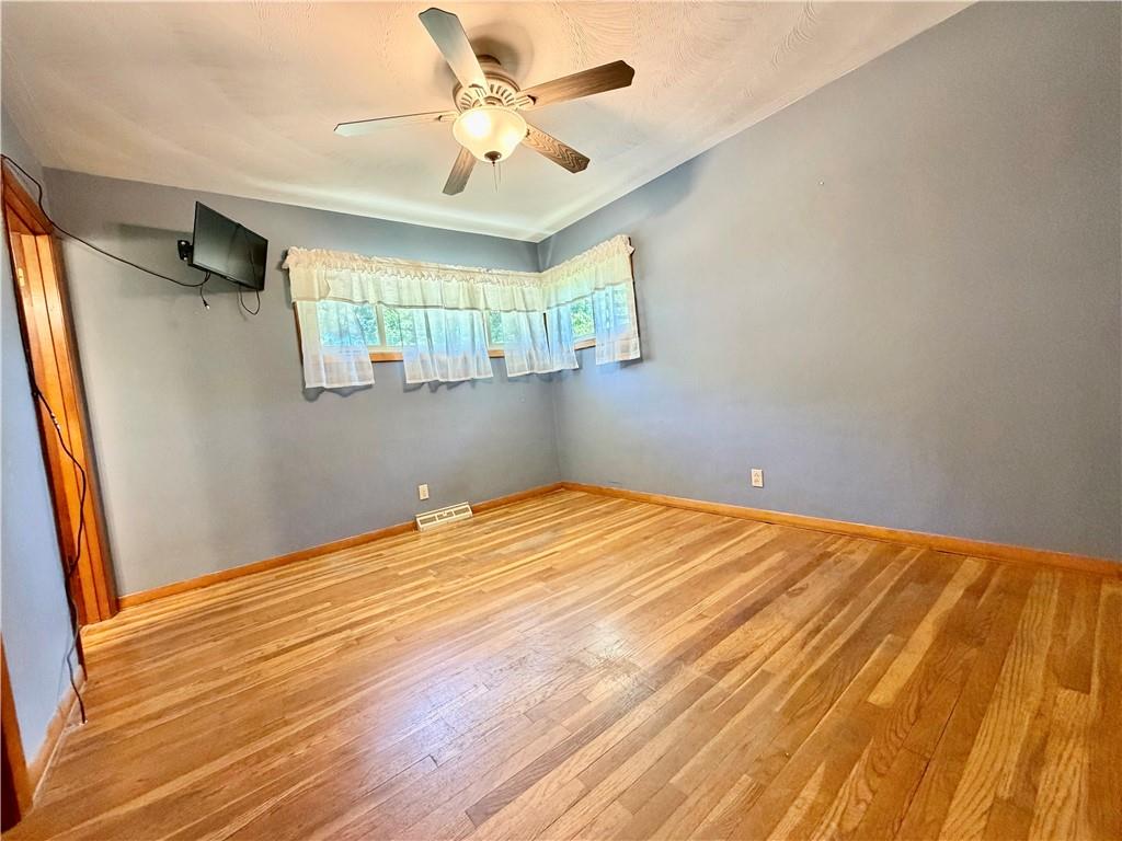 121 Kemar Drive Butler, PA 16002 - Photo 18 of 31 a view of empty room with wooden floor and fan