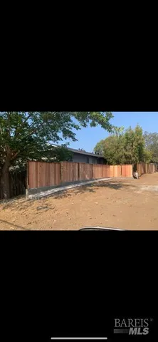 a view of lake from a back yard