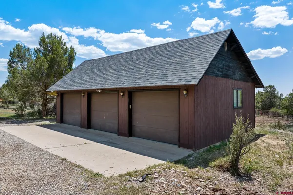 a front view of house with garage