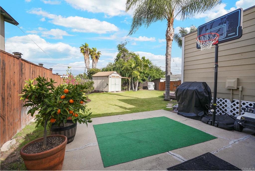511 El Monte Road El Cajon, CA 92020 - Photo 14 of 30 a view of a backyard with potted plants