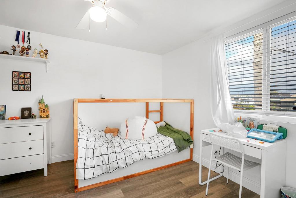 511 El Monte Road El Cajon, CA 92020 - Photo 18 of 30 a view of a workspace with furniture and wooden floor