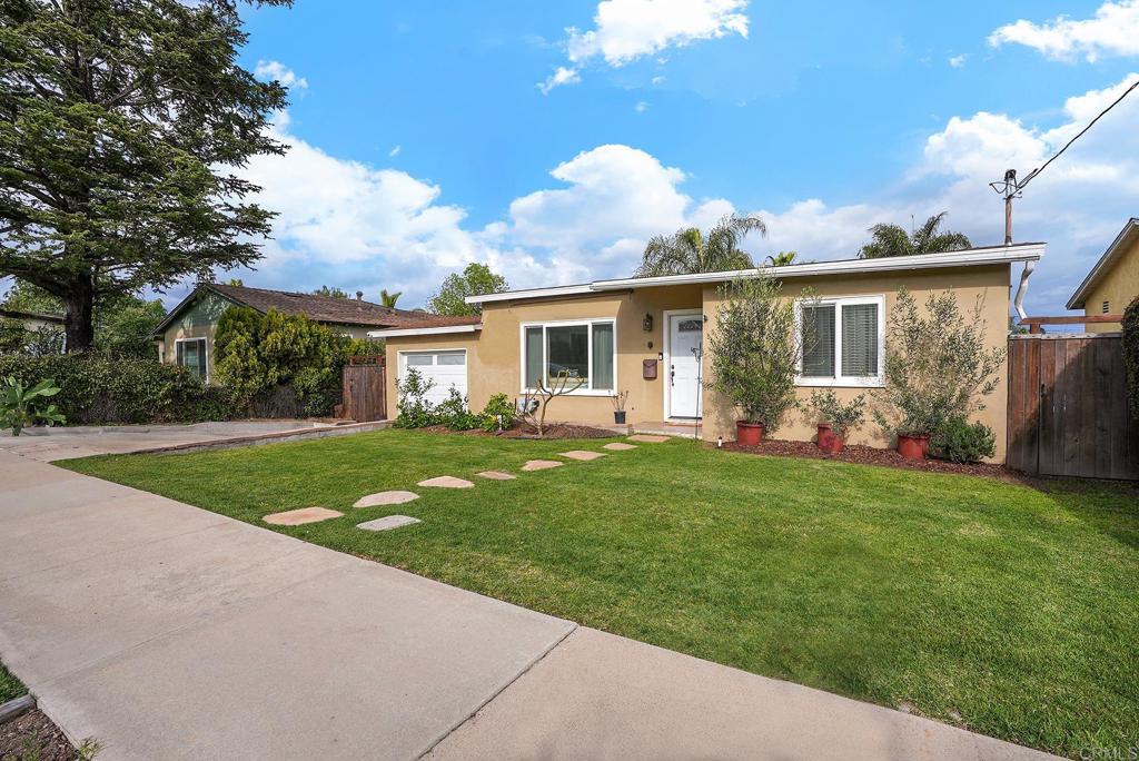 511 El Monte Road El Cajon, CA 92020 - Photo 2 of 30 a view of a house with backyard and garden