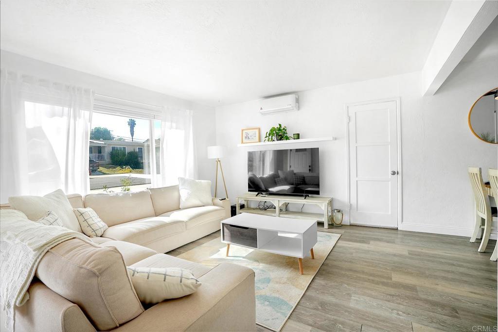 511 El Monte Road El Cajon, CA 92020 - Photo 23 of 30 a living room with furniture and a flat screen tv