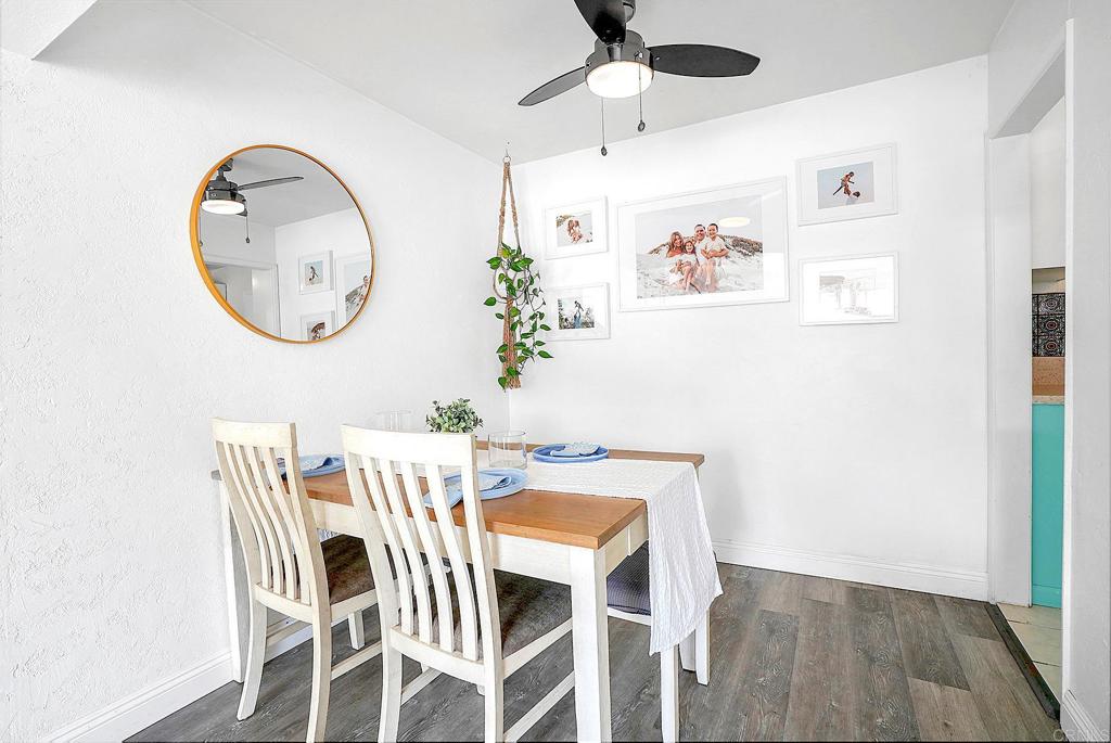 511 El Monte Road El Cajon, CA 92020 - Photo 25 of 30 a view of a dining room with furniture and wooden floor