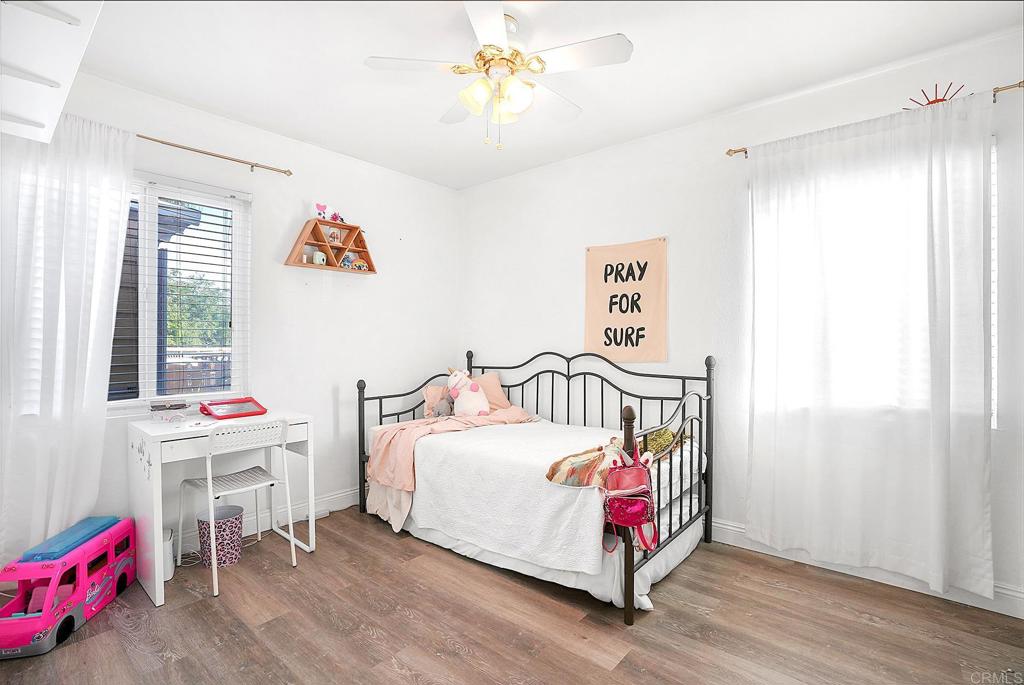 511 El Monte Road El Cajon, CA 92020 - Photo 30 of 30 a bedroom with a bed and a table