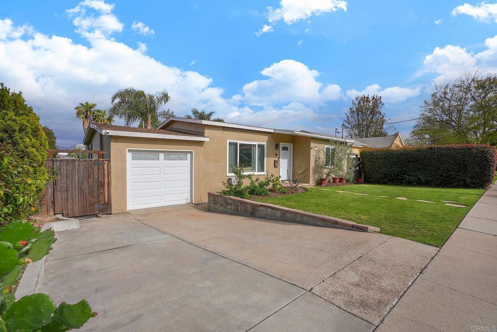 511 El Monte Road El Cajon, CA 92020 - Photo 4 of 30 front view of a house with a yard