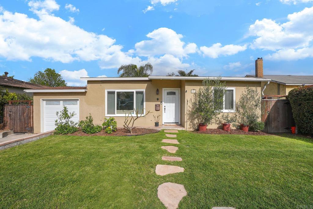 511 El Monte Road El Cajon, CA 92020 - Photo 5 of 30 a view of a house with backyard and porch
