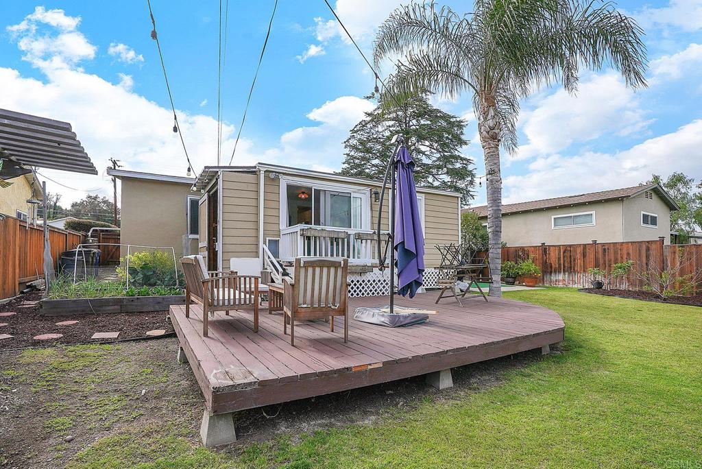 511 El Monte Road El Cajon, CA 92020 - Photo 8 of 30 a view of a house with backyard and sitting area