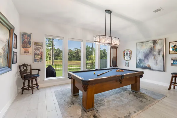 a living room with furniture and window