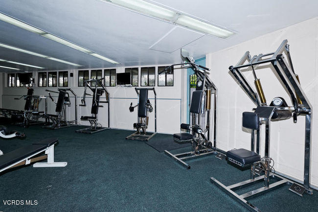 3101 Peninsula Road, Unit 105 Oxnard, CA 93035 - Photo 22 of 36 a view of a room with gym equipment