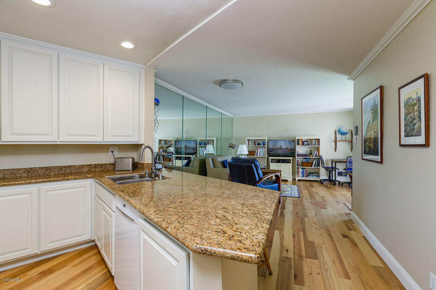 3101 Peninsula Road, Unit 105 Oxnard, CA 93035 - Photo 36 of 36 a kitchen with lots of counter top space and furniture
