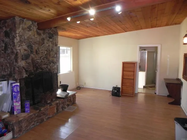 a view of a fountain in the backyard of house