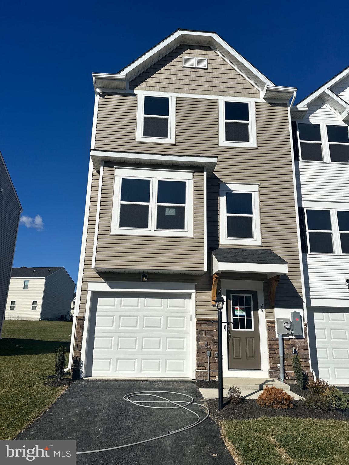 29 Trotting Road Inwood, WV 25428 - Photo 1 of 19 a front view of a house with a yard