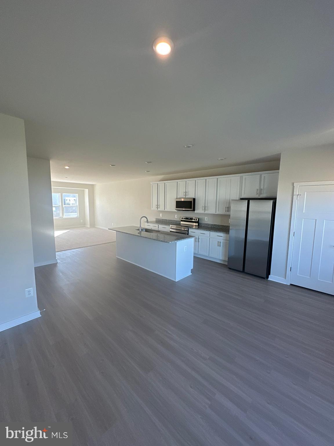 29 Trotting Road Inwood, WV 25428 - Photo 15 of 19 a view of kitchen with wooden floor and electronic appliances