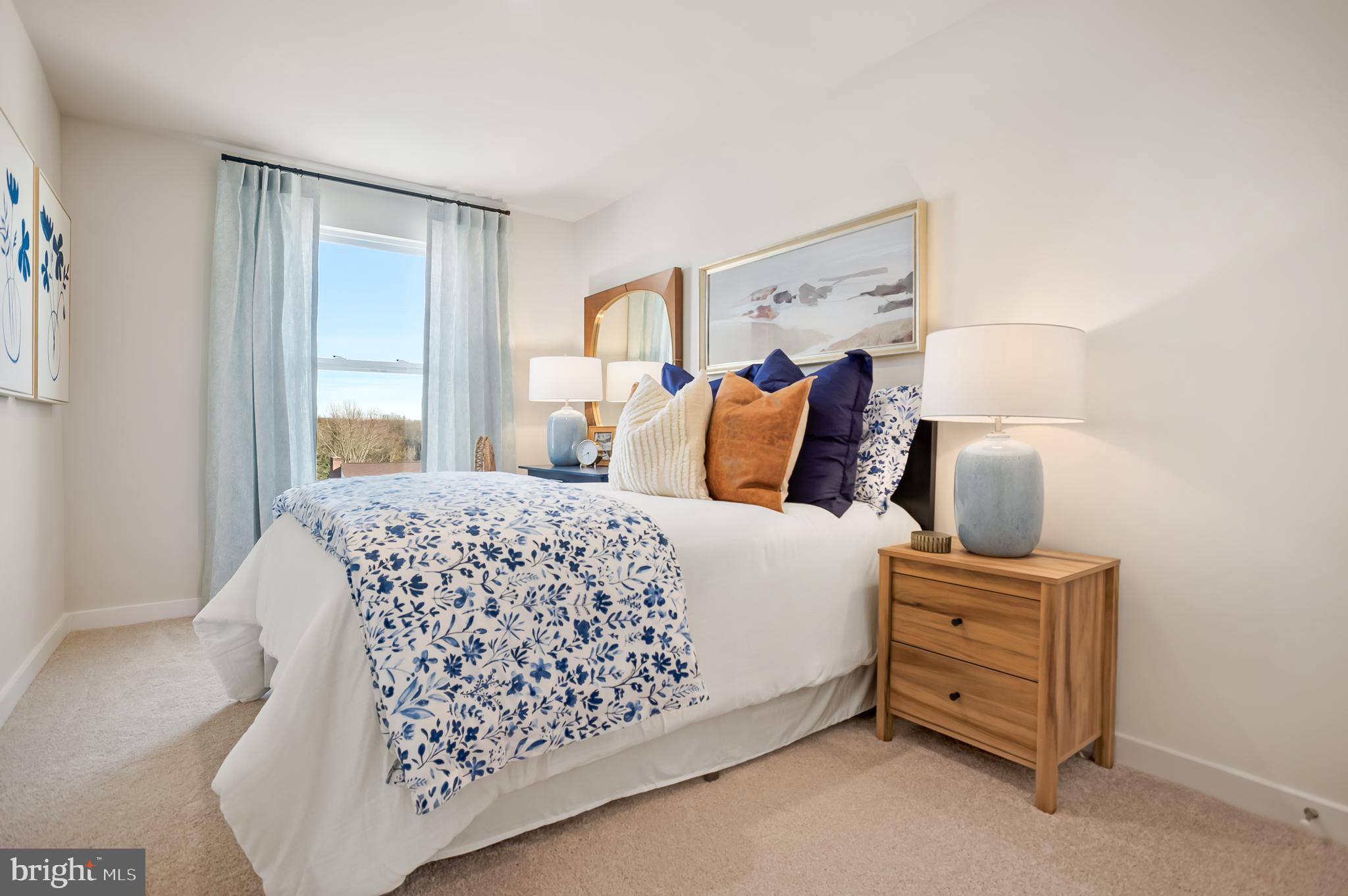 29 Trotting Road Inwood, WV 25428 - Photo 4 of 19 a bedroom with a bed and a window