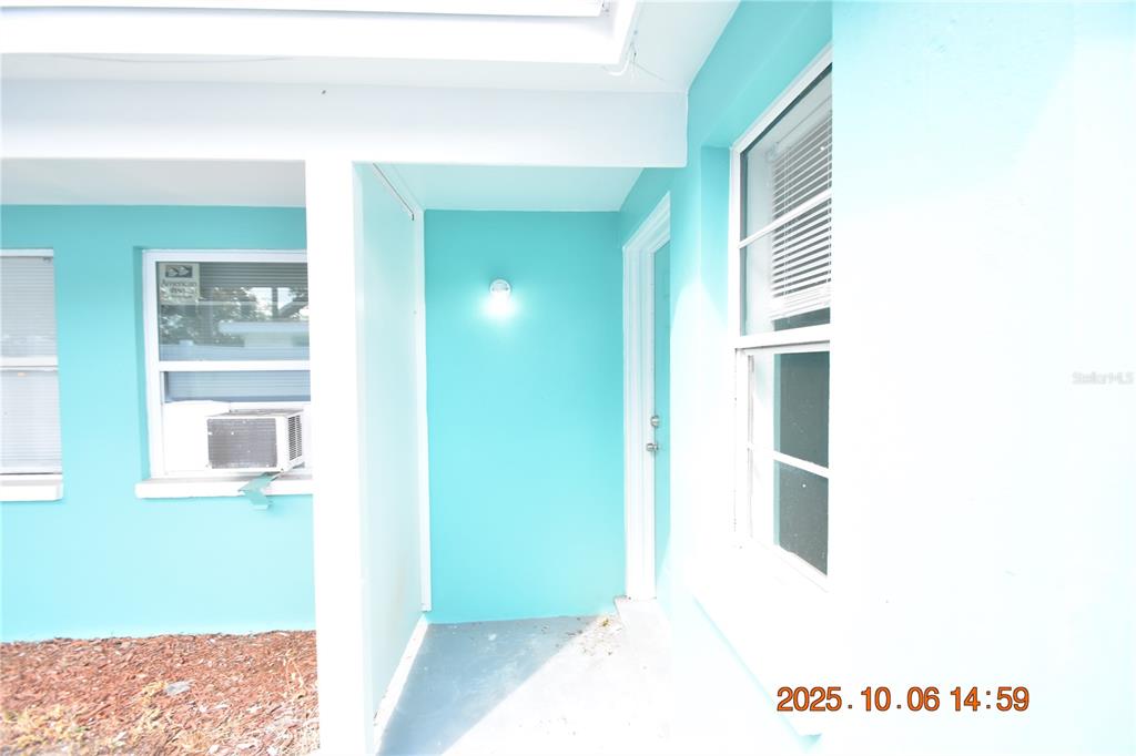 401 Milwaukee Avenue, Unit 401 Dunedin, FL 34698 - Photo 5 of 23 a picture of a bathroom with a bench