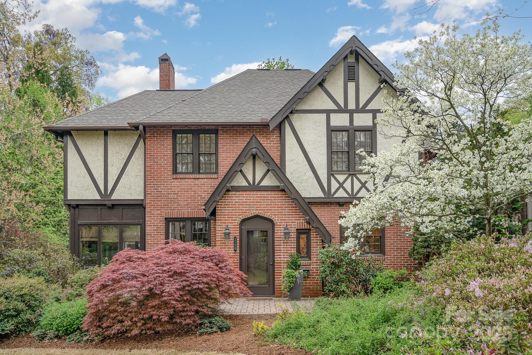 2120 Malvern Road Charlotte, NC 28207 - Photo 1 of 48 a front view of a house with yard and green space