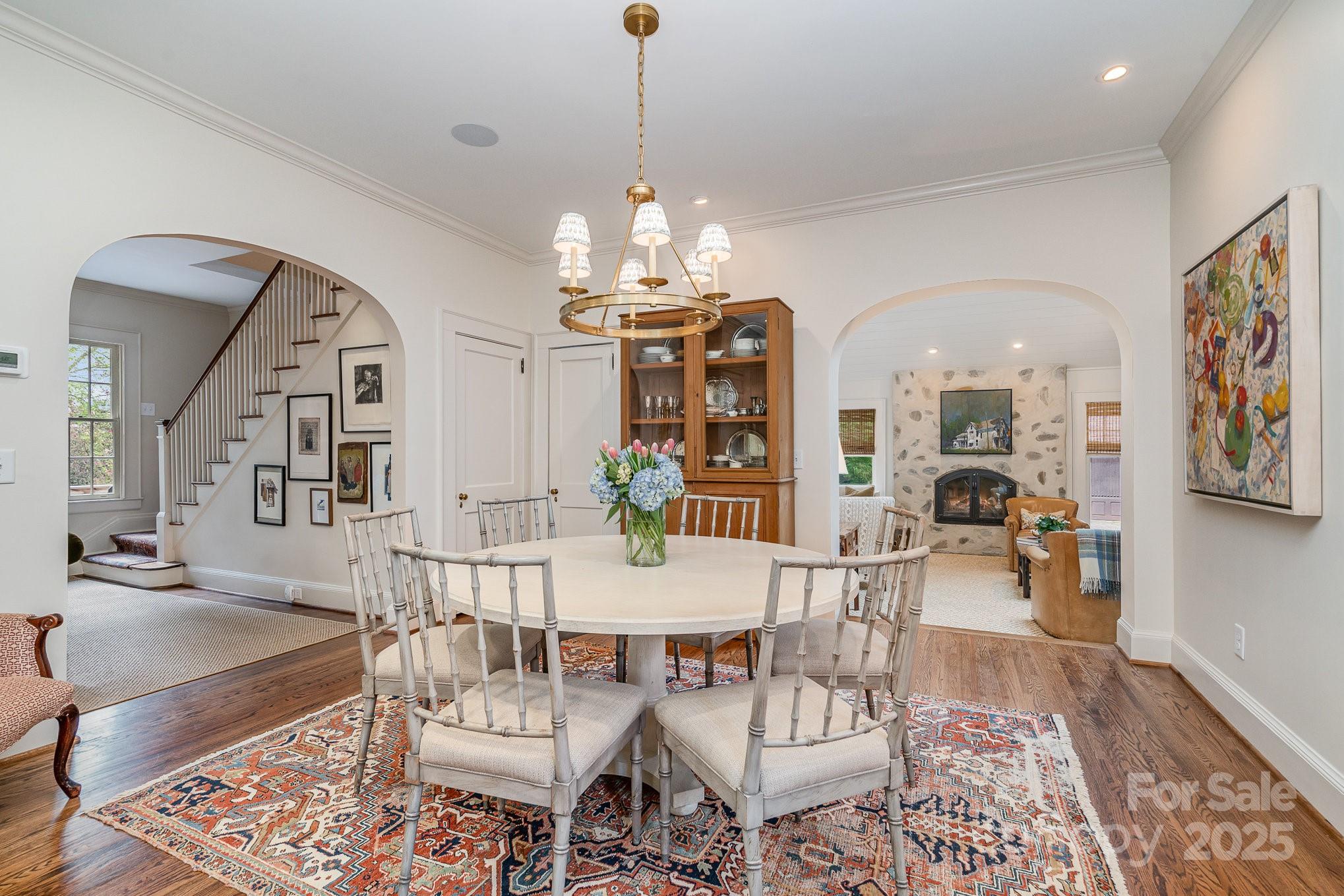 2120 Malvern Road Charlotte, NC 28207 - Photo 13 of 48 a view of a dining room with furniture and wooden floor