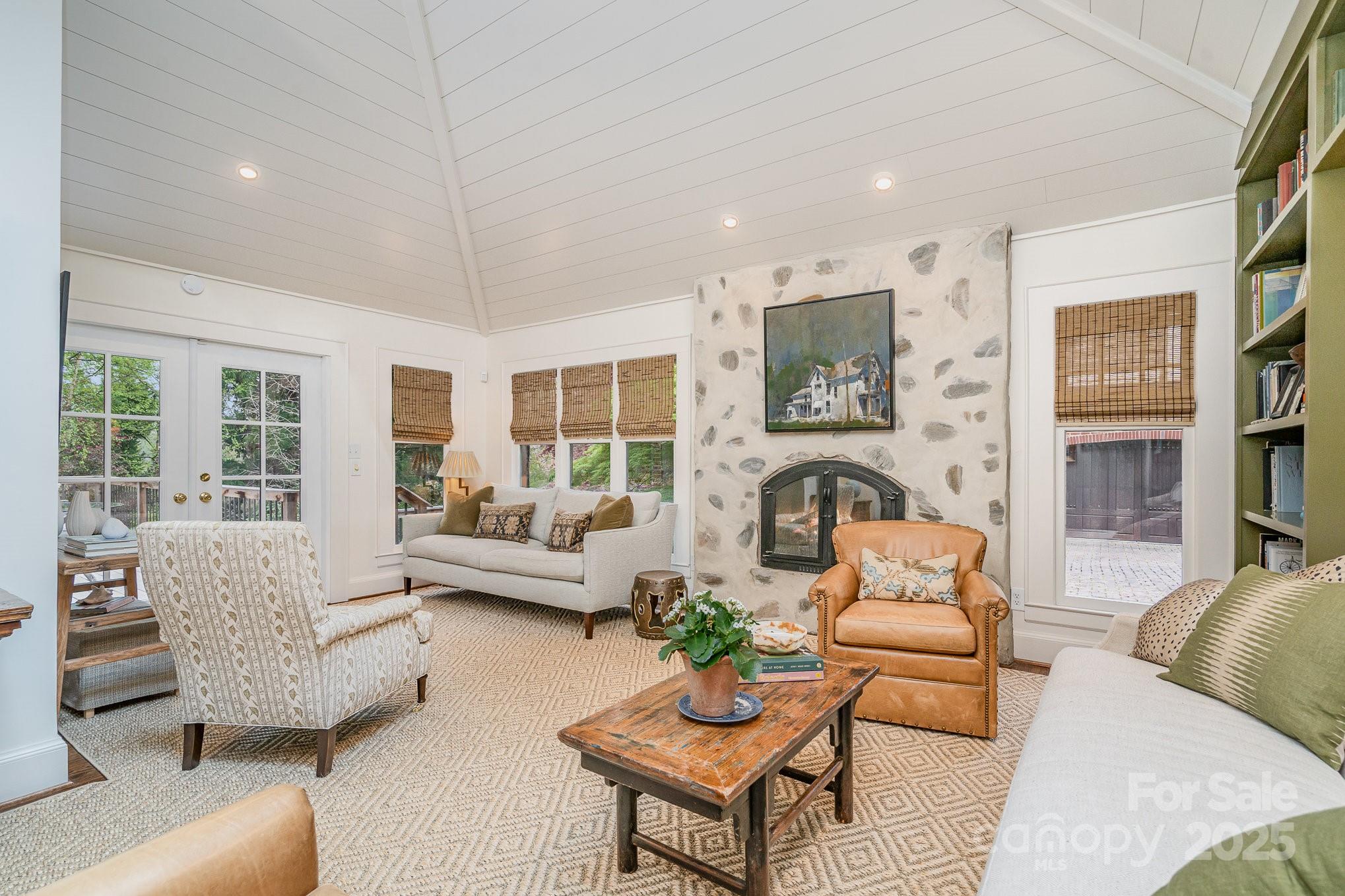 2120 Malvern Road Charlotte, NC 28207 - Photo 17 of 48 a living room with furniture and a fireplace