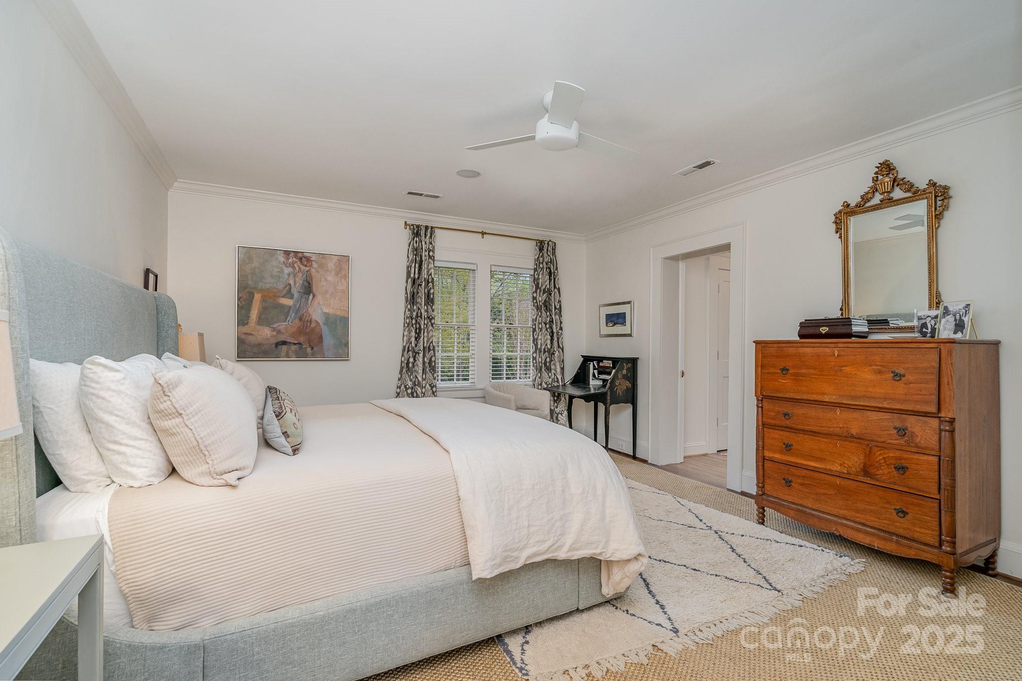 2120 Malvern Road Charlotte, NC 28207 - Photo 20 of 48 a bedroom with a bed and a dresser