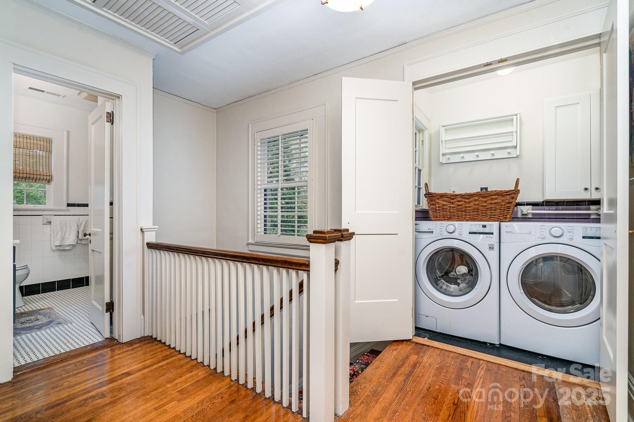 2120 Malvern Road Charlotte, NC 28207 - Photo 26 of 48 a view of a bedroom with washer and dryer