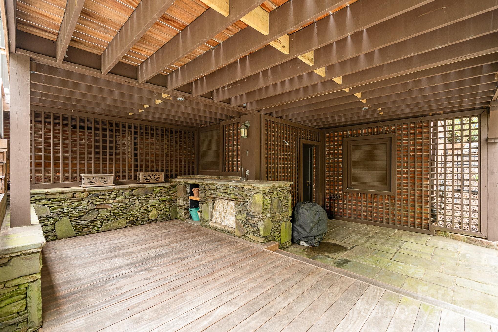 2120 Malvern Road Charlotte, NC 28207 - Photo 31 of 48 a view of a porch with a table and chairs