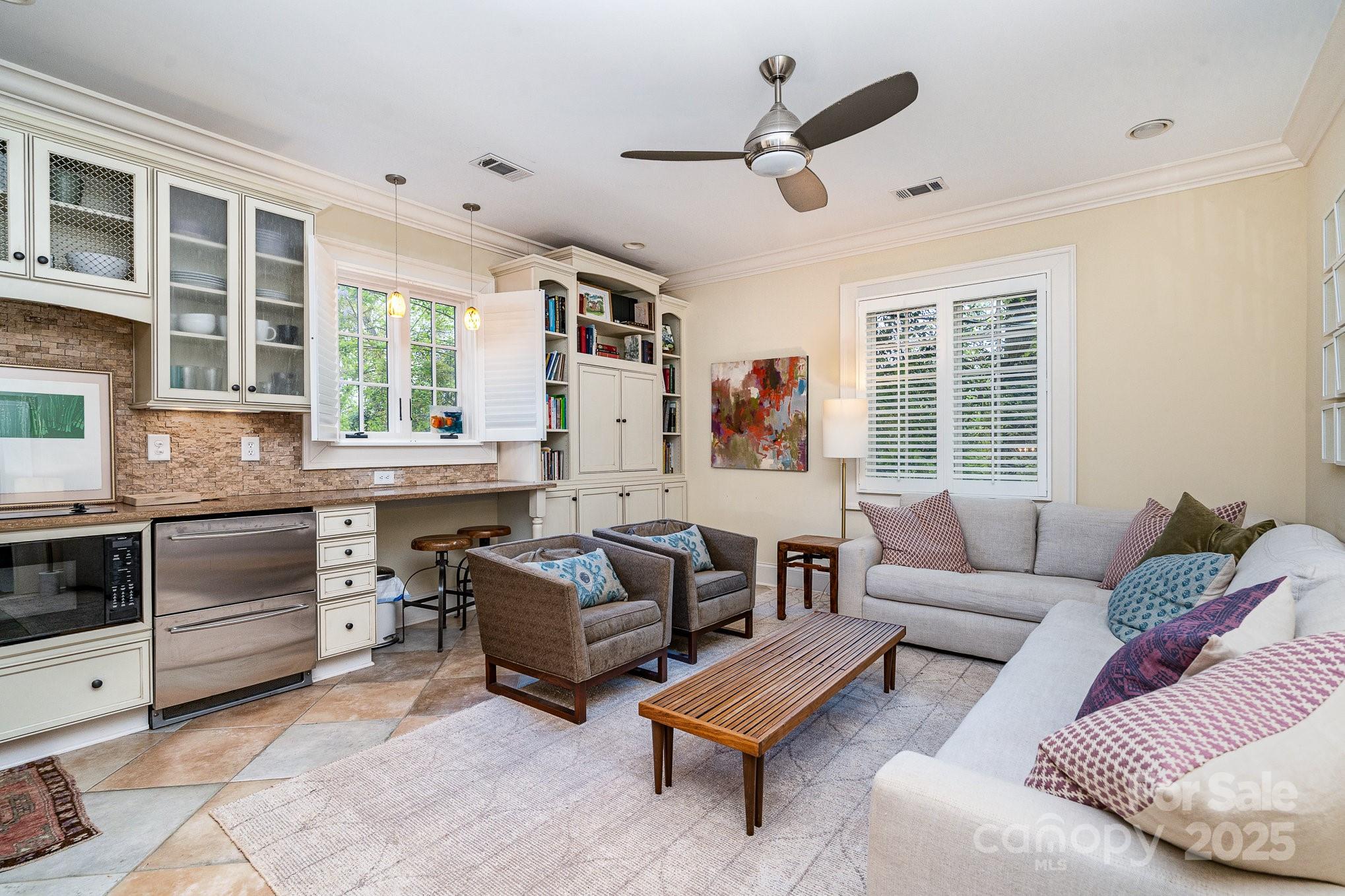 2120 Malvern Road Charlotte, NC 28207 - Photo 37 of 48 a living room with furniture and a large window