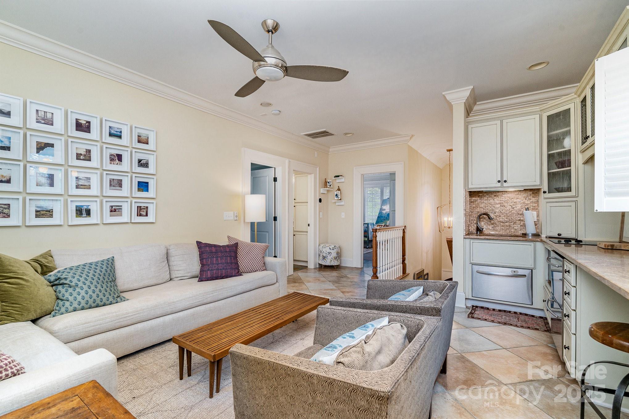 2120 Malvern Road Charlotte, NC 28207 - Photo 38 of 48 a living room with furniture and kitchen view
