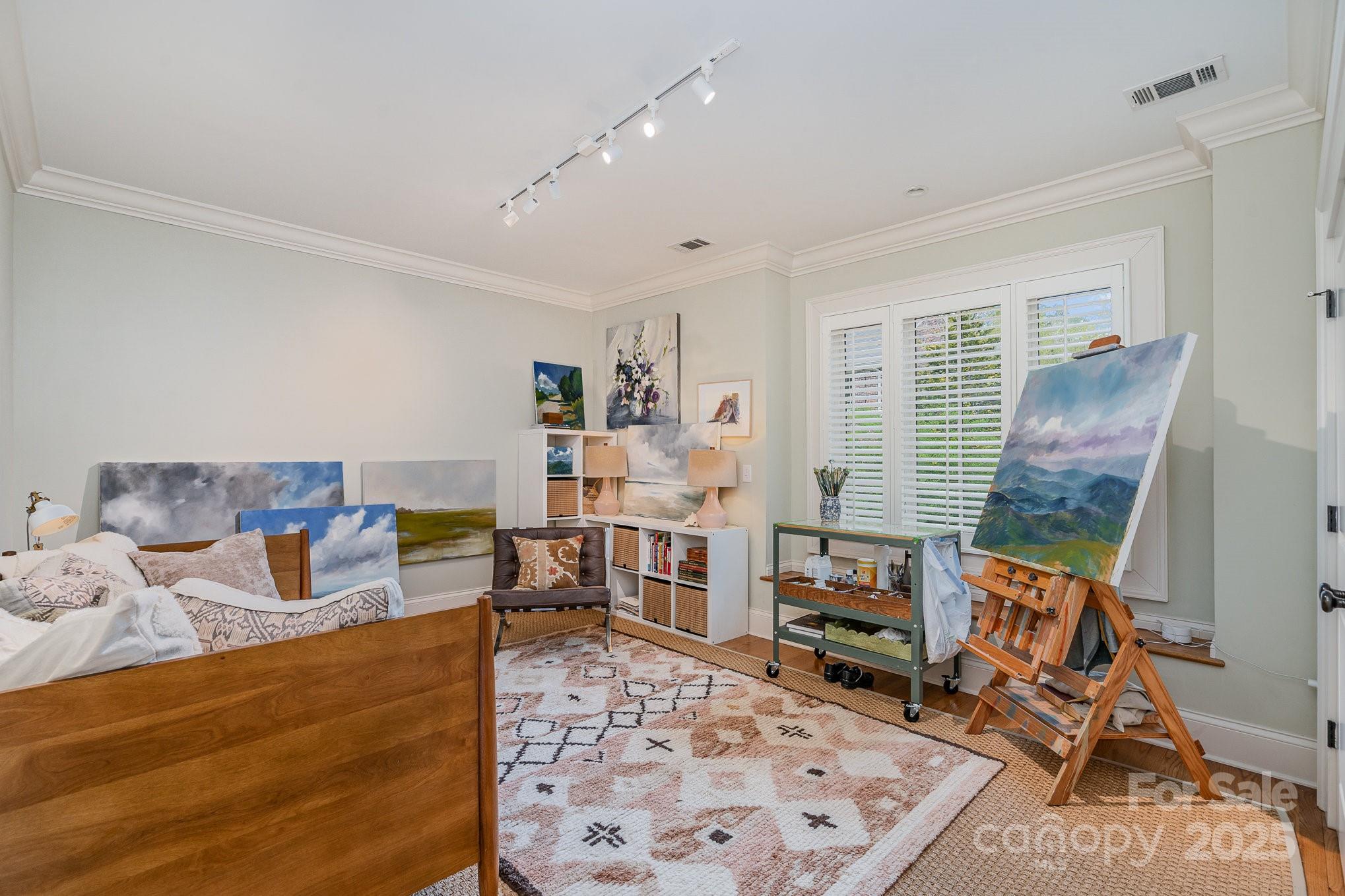 2120 Malvern Road Charlotte, NC 28207 - Photo 42 of 48 a living room with furniture and a wooden floor