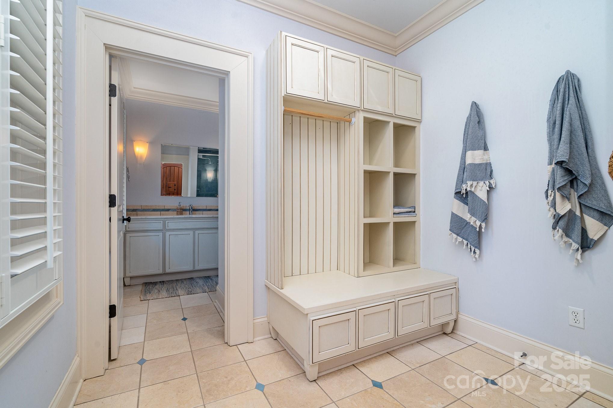 2120 Malvern Road Charlotte, NC 28207 - Photo 43 of 48 a spacious bathroom with a double vanity sink a mirror and a bathtub