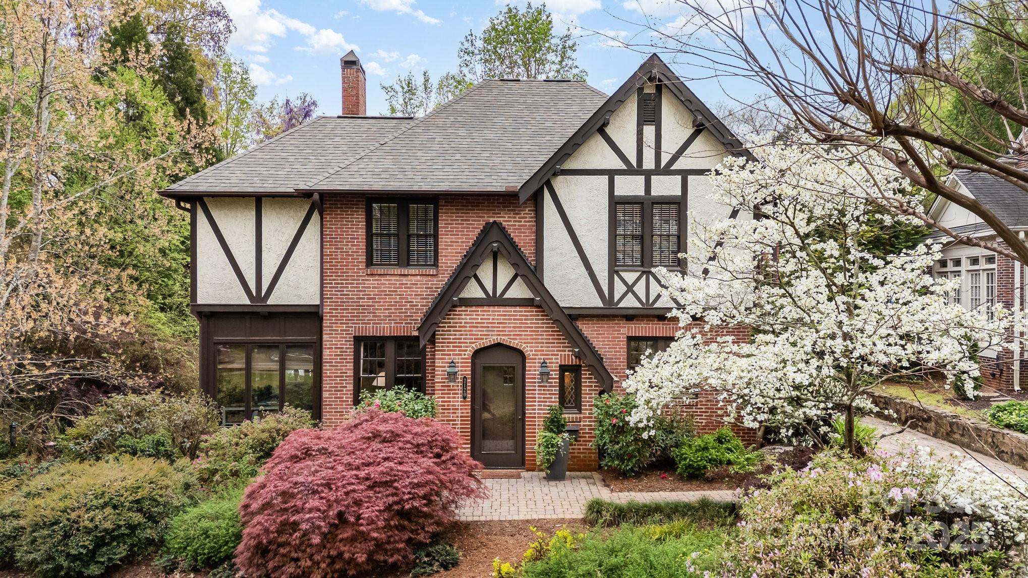 2120 Malvern Road Charlotte, NC 28207 - Photo 48 of 48 a front view of a house with garden