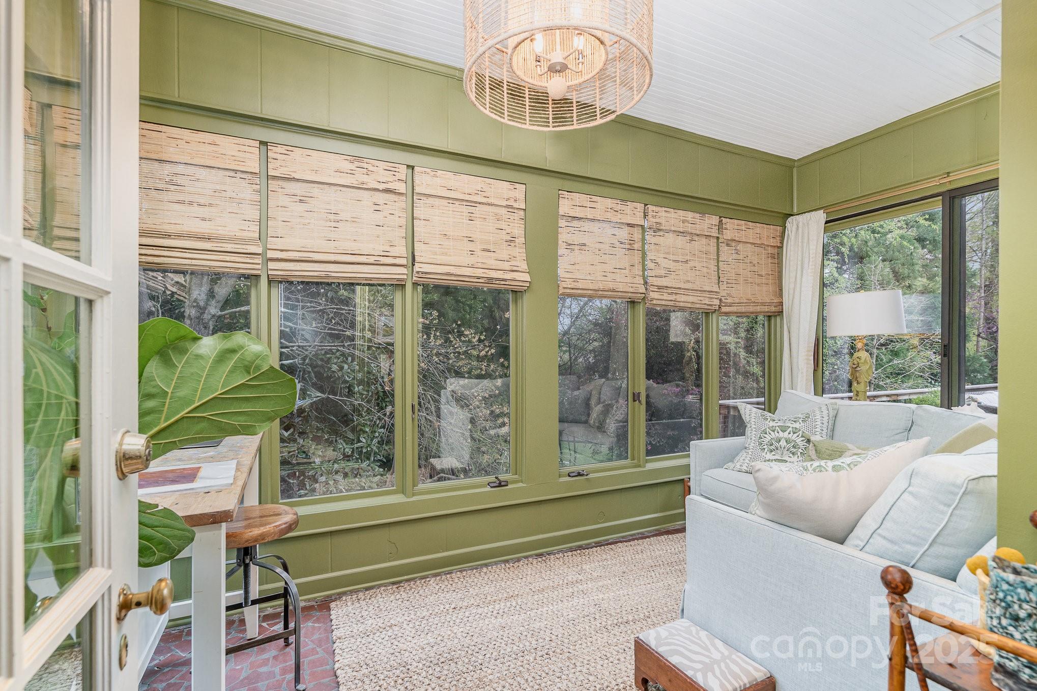 2120 Malvern Road Charlotte, NC 28207 - Photo 5 of 48 a living room with furniture and a large window