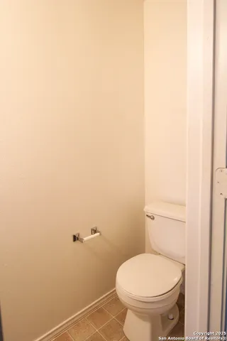 a bathroom with a toilet